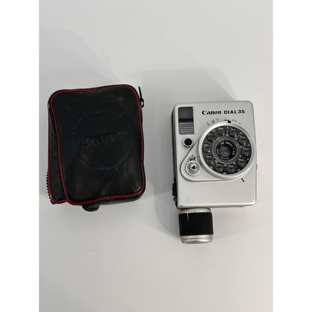 Canon Dial 35 Half Frame Camera With Leather Bag. Read